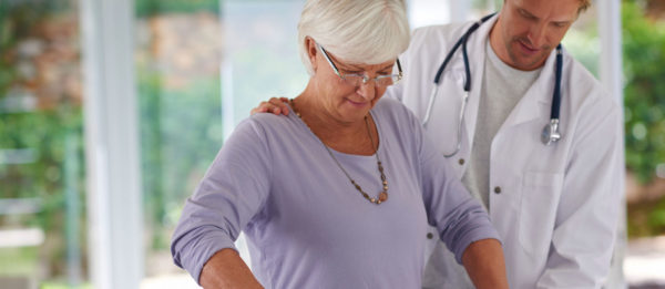 doctor with patient in rehabilitation