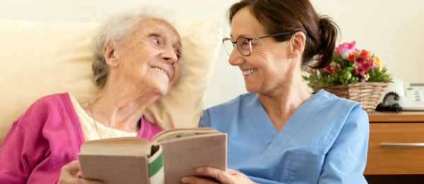 patient and nurse reading